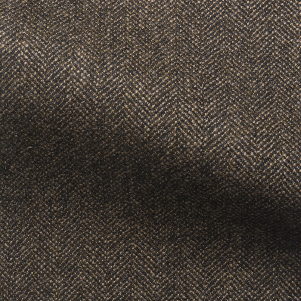 Goodwood Herringbone Tweed furnishing fabric in a dark brown colour