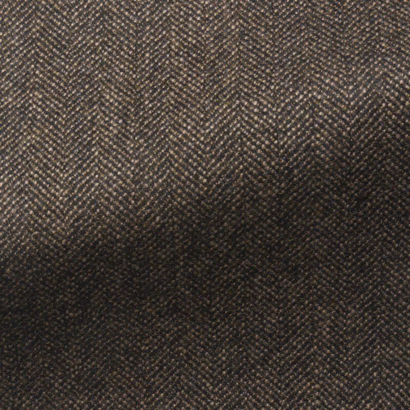 Goodwood Herringbone Tweed furnishing fabric in a dark brown colour