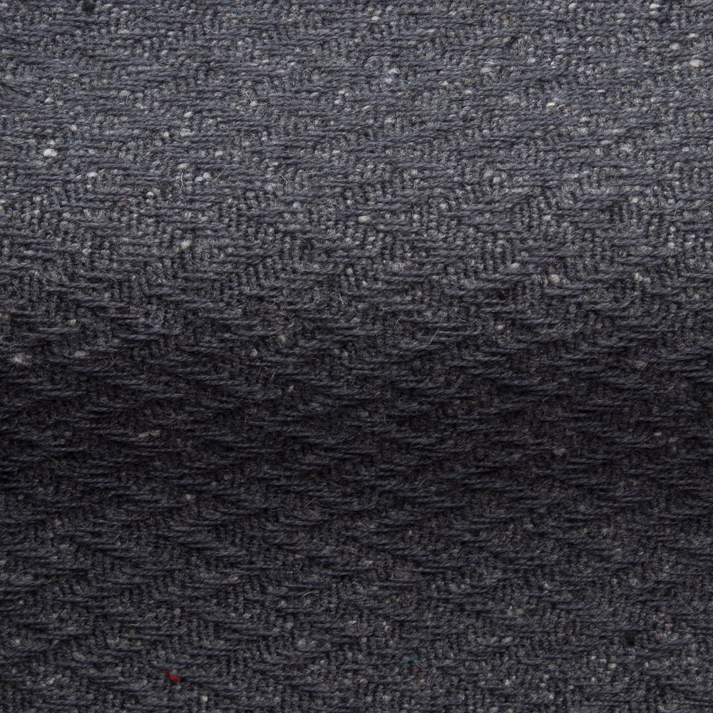 Textured high performance fabric for upholstery or heavy curtains in a charcoal colour