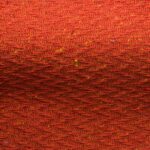 Textured high performance fabric for upholstery or heavy curtains in a Dusk Orange colour