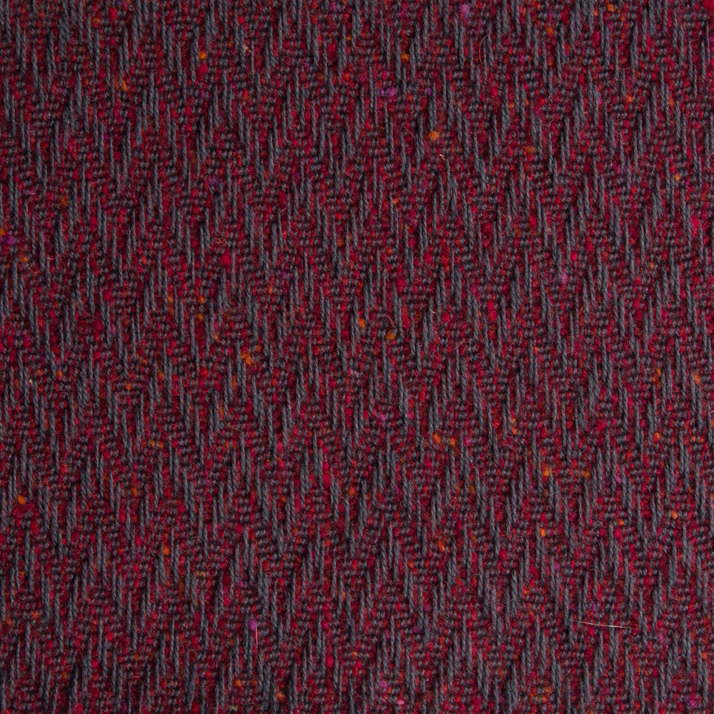Textured high performance fabric for upholstery or heavy curtains in a Garnett colour