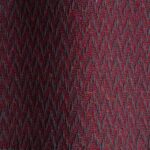 Textured high performance fabric for upholstery or heavy curtains in a Garnett colour