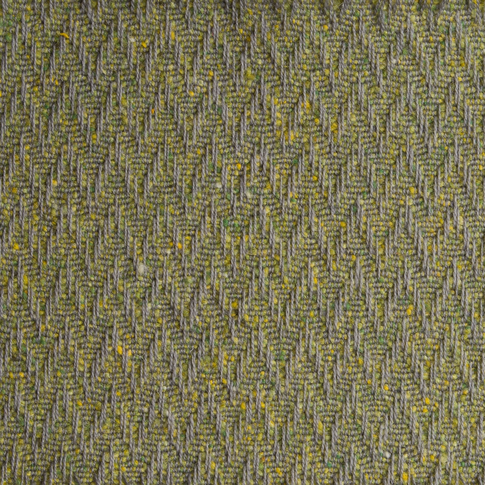 Textured high performance fabric for upholstery or heavy curtains in a lime colour