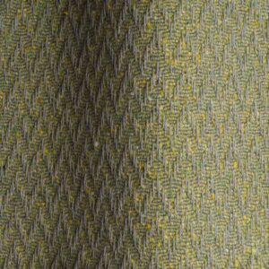 Textured high performance fabric for upholstery or heavy curtains in a lime colour