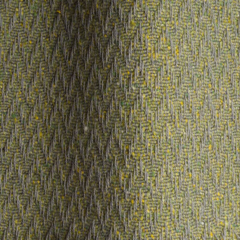 Textured high performance fabric for upholstery or heavy curtains in a lime colour