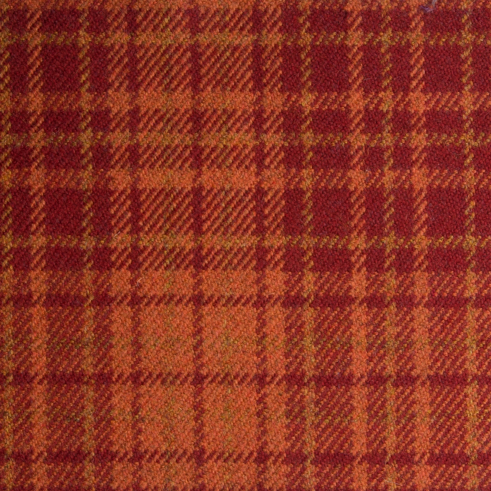 Plaid Fabric in amber for upholstery or heavy curtains.