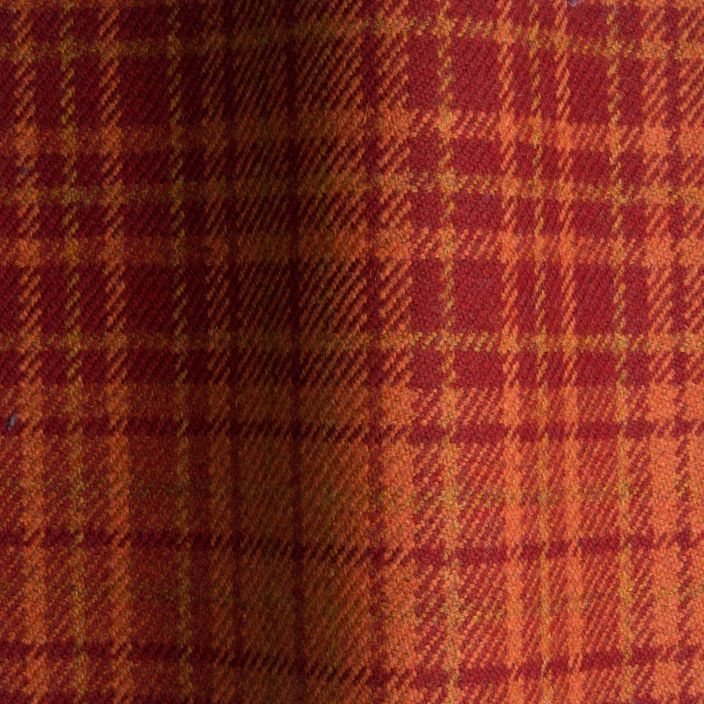 Plaid Fabric in amber for upholstery or heavy curtains.