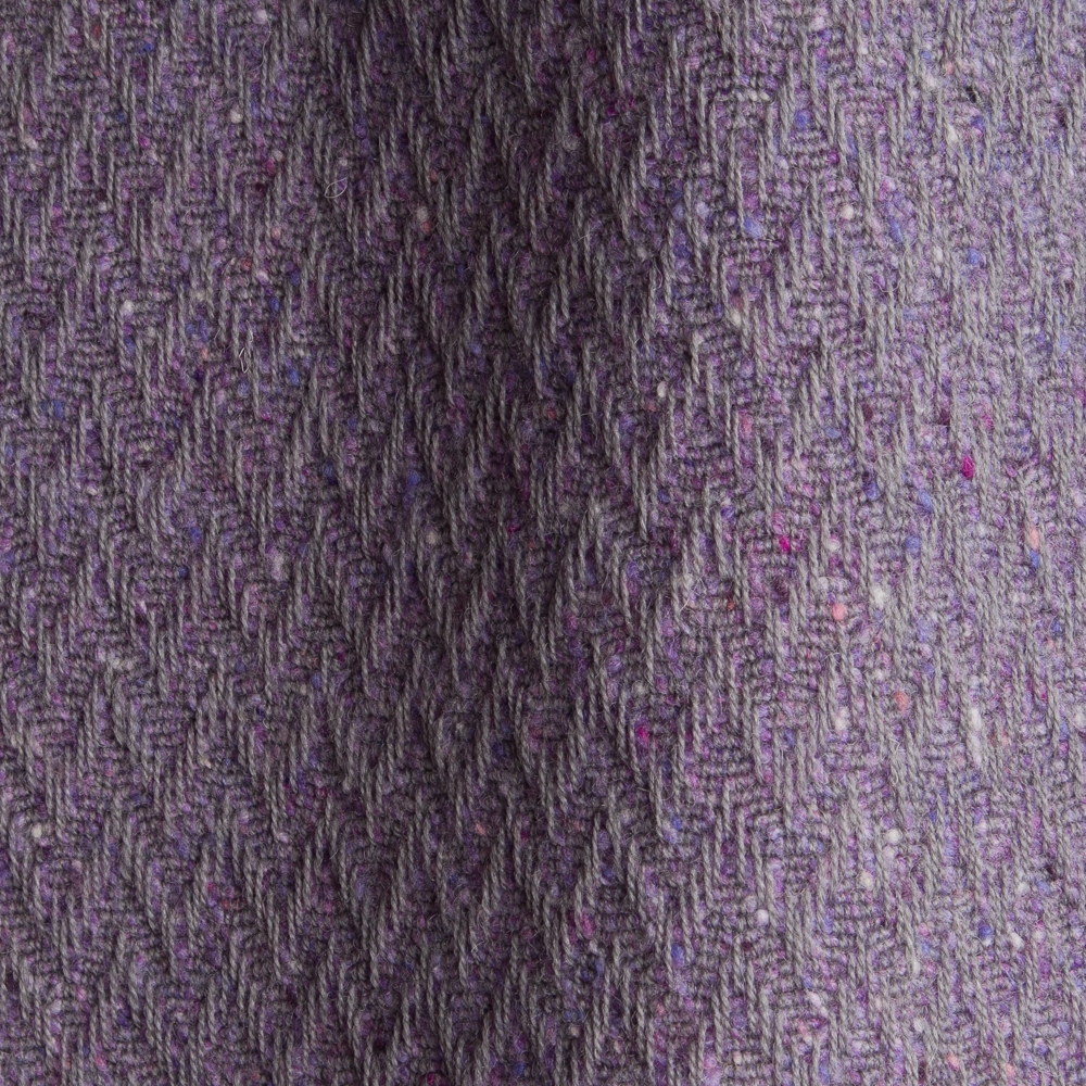 Textured high performance fabric for upholstery or heavy curtains in a violet colour